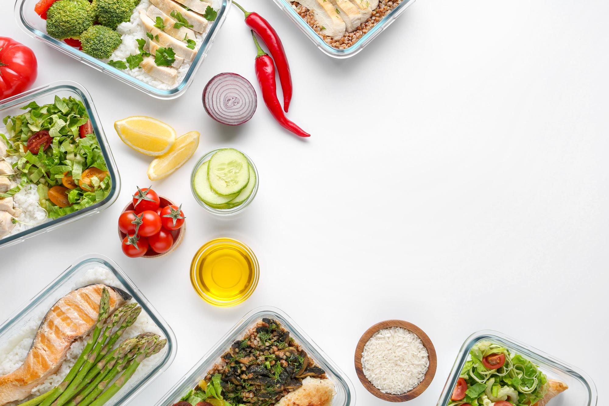 Meal prep containers lined on a kitchen counter